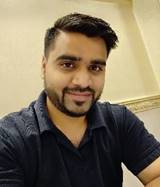A person taking a selfie

Description automatically generated