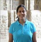 A picture containing person, posing, blue

Description automatically generated