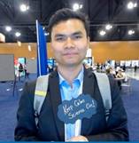 A picture containing text, person, blue

Description automatically generated