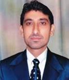 A person in a suit

Description automatically generated with medium confidence