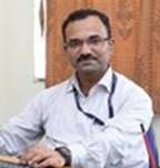 A doctor with a stethoscope around his neck

Description automatically generated